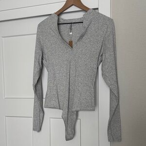 SKIMS cotton rib, long sleeve Henley Bodysuit